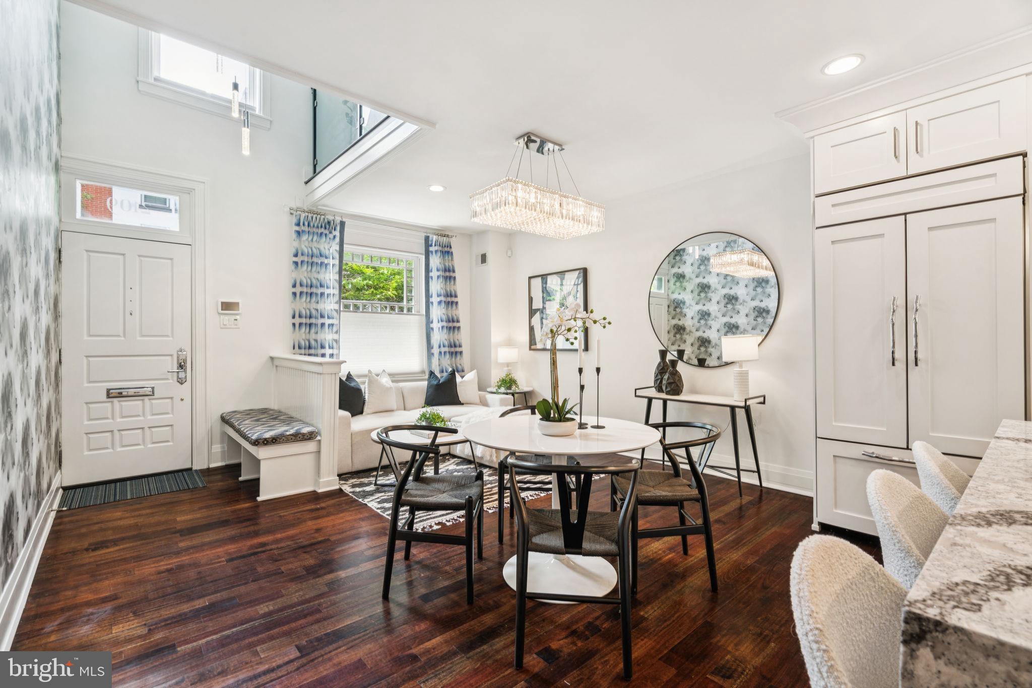 2109 Locust Street Philadelphia, PA 19103 - Photo 2 of 38 a view of a dining room with furniture window and wooden floor