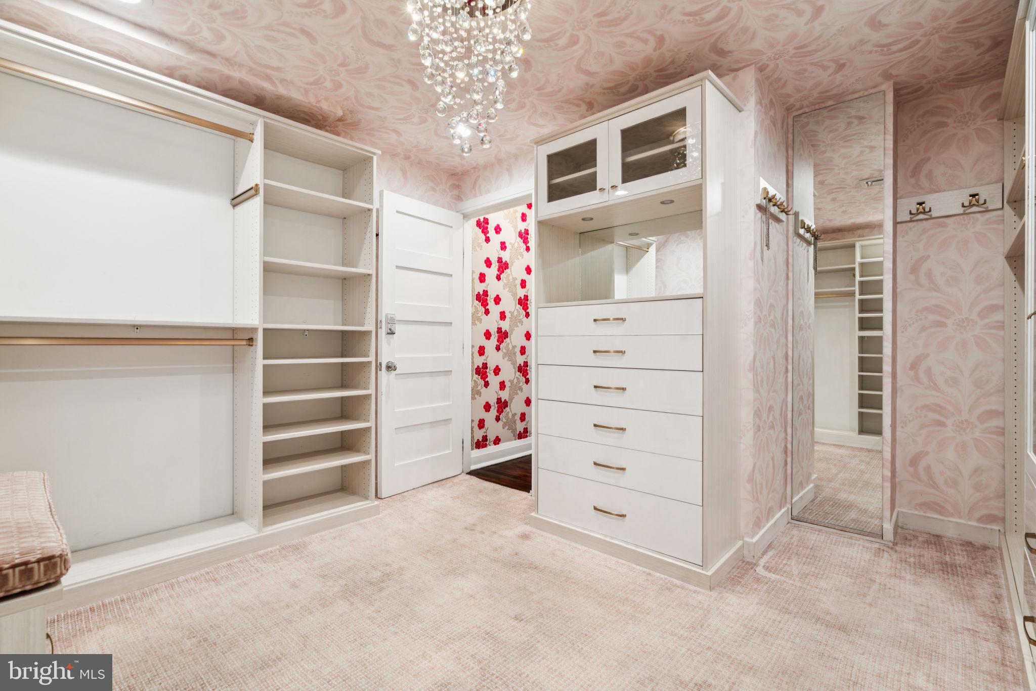 2109 Locust Street Philadelphia, PA 19103 - Photo 24 of 38 a view of walk in closet with clothes and shoes