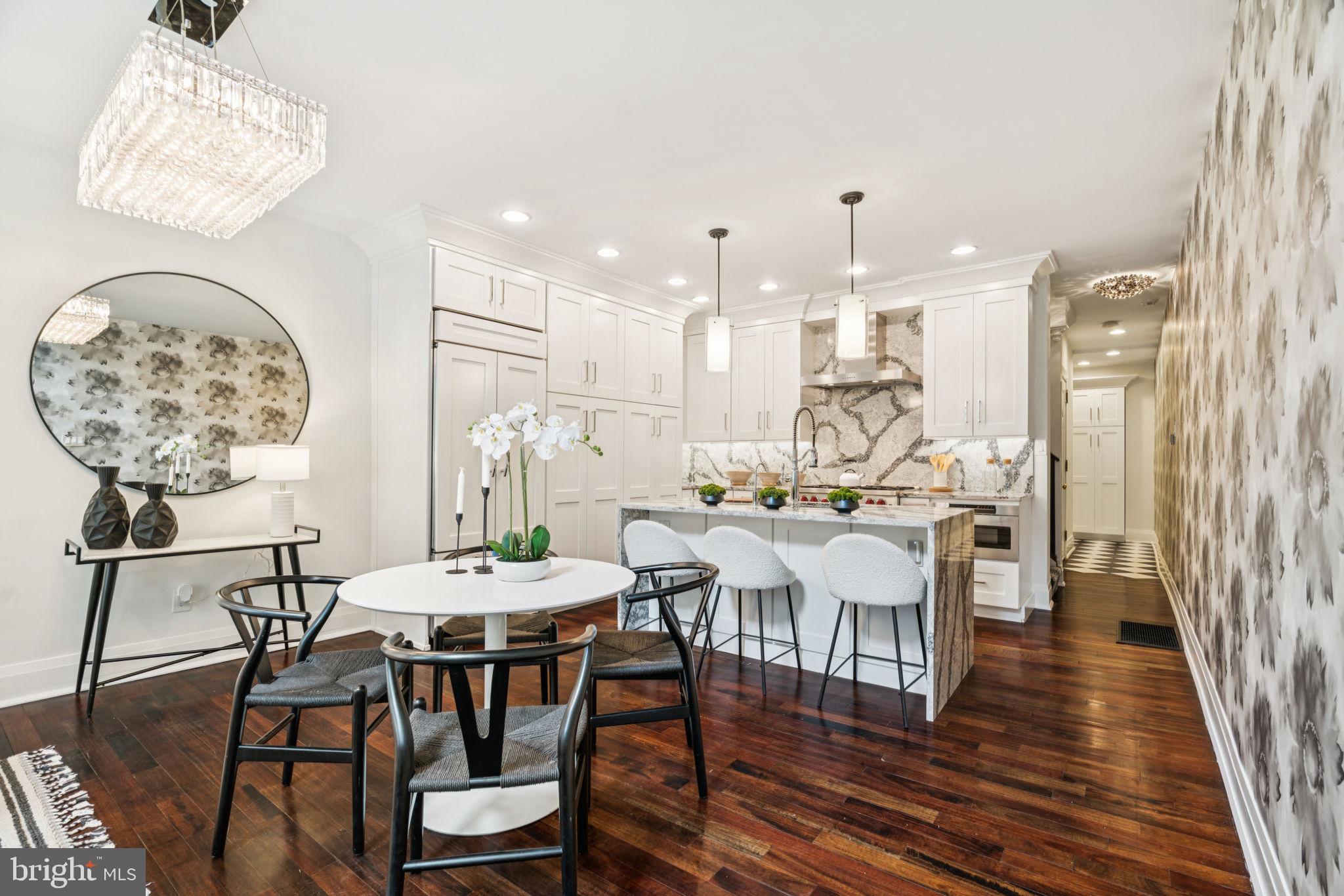 2109 Locust Street Philadelphia, PA 19103 - Photo 3 of 38 a view of a dining room with furniture window and wooden floor