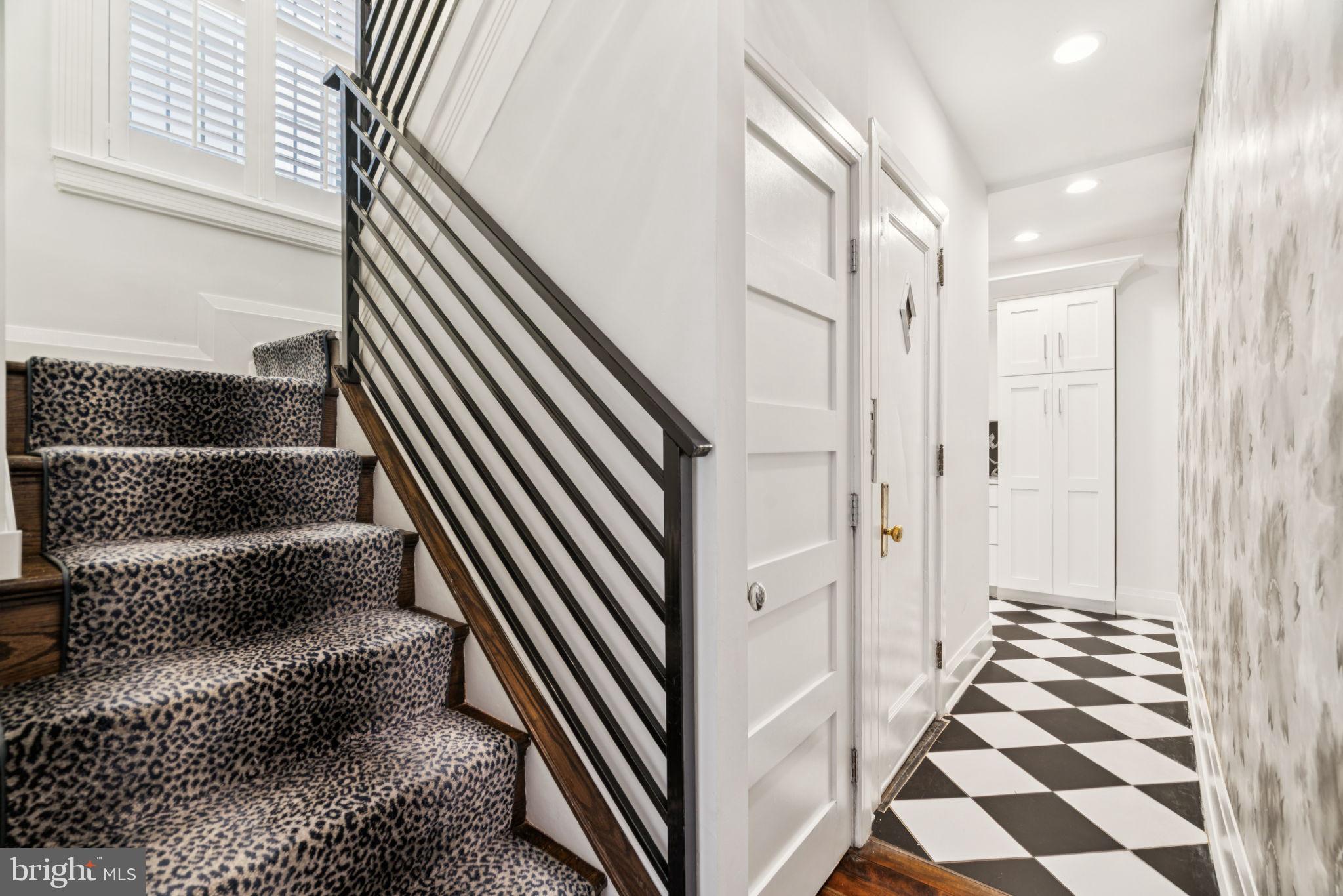 2109 Locust Street Philadelphia, PA 19103 - Photo 7 of 38 a view of a hallway with wooden floor and windows