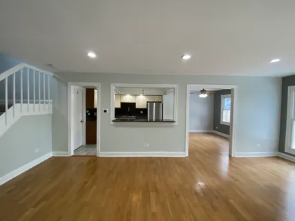a view of a kitchen and a window