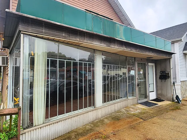 a view of a house with a large window