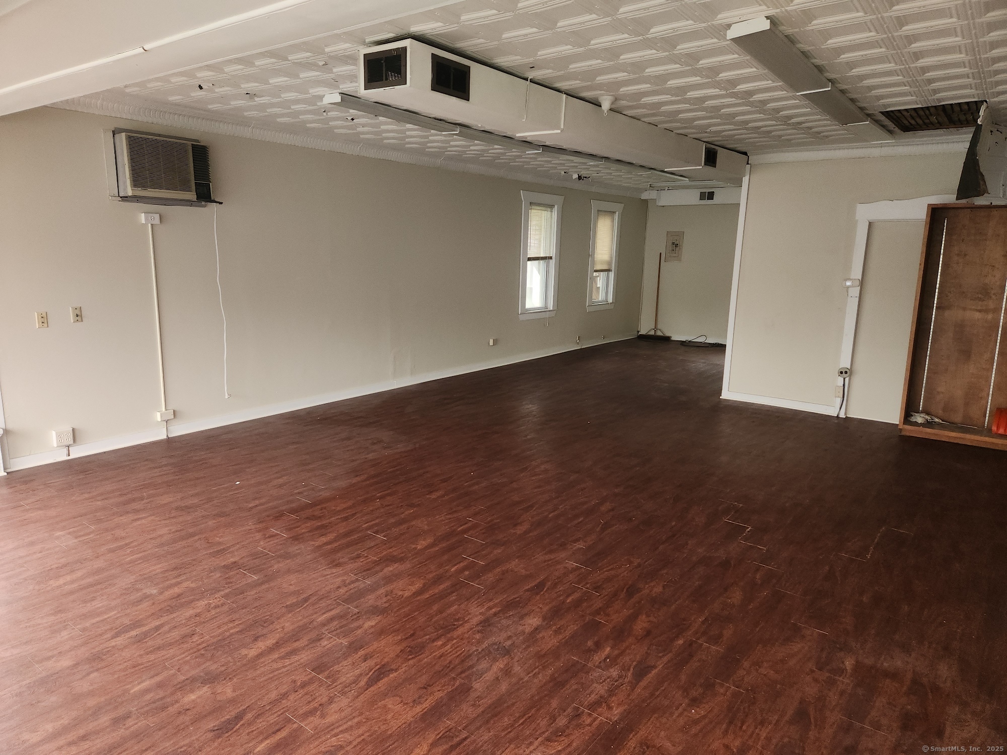 38 Clifton Avenue Ansonia, CT 06401 - Photo 5 of 11 a view of a hallway with wooden floor