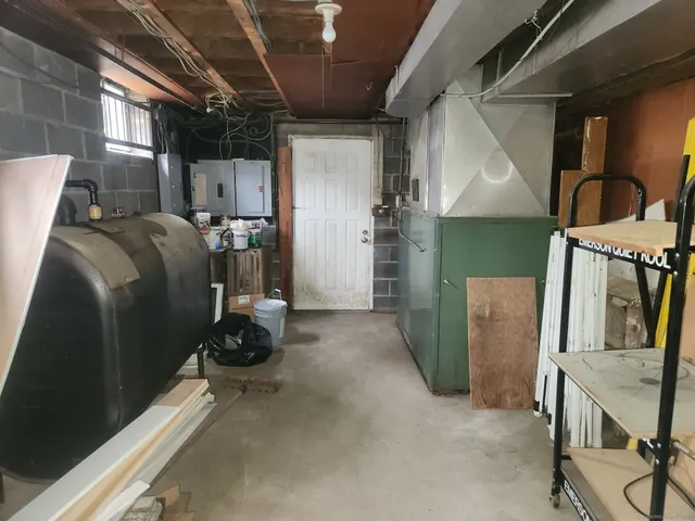 a view of a room with wooden door
