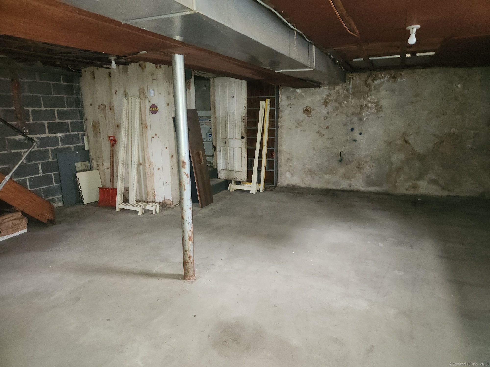 38 Clifton Avenue Ansonia, CT 06401 - Photo 8 of 11 a view of a room with wooden door