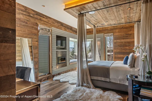 a view of bedroom with balcony