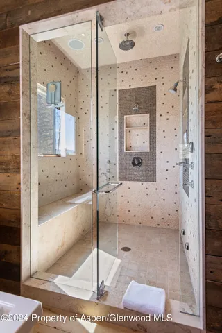 a kitchen with a stove a sink and a refrigerator