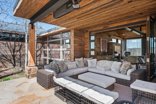 a outdoor living space with patio furniture and a potted plant