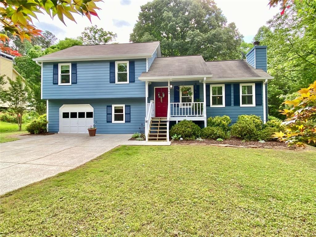 front view of a house with a yard