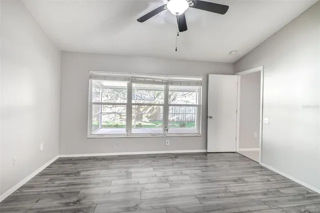 a bathroom with a double vanity sink and mirror