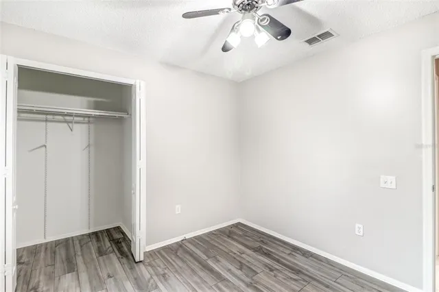 a view of outdoor space with wooden floor