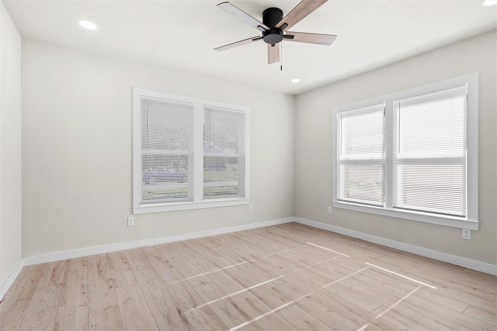 1300 East Baltimore Avenue Fort Worth, TX 76104 - Photo 13 of 25 a view of an empty room with a window