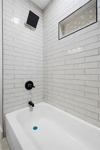a bathroom with a bathtub