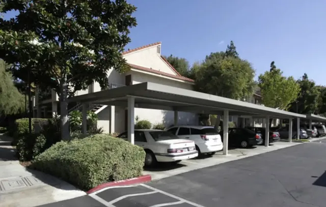 a view of car parked in front of house