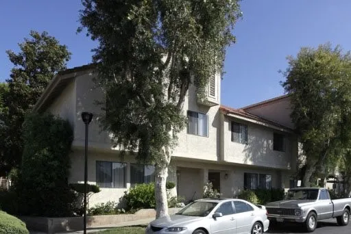 a front view of a building with street view