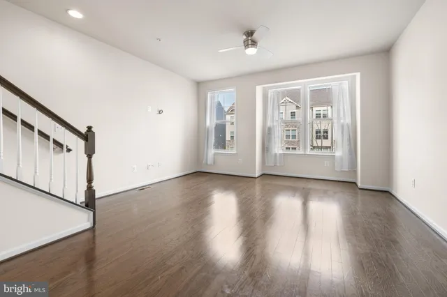 a kitchen with stainless steel appliances granite countertop a stove and a refrigerator