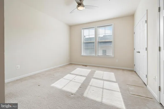 a bathroom with a double vanity sink mirror and