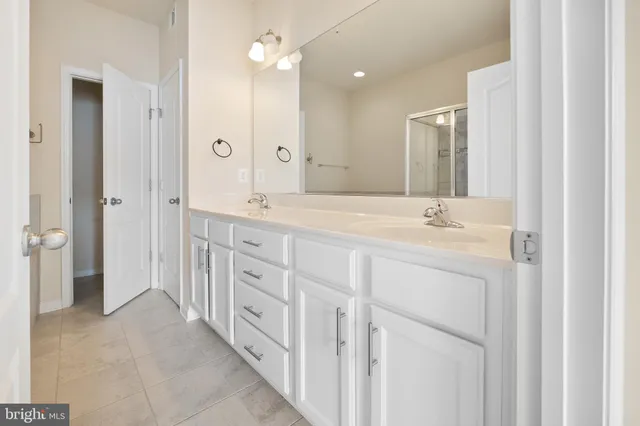 a spacious bathroom with a bathtub and toilet