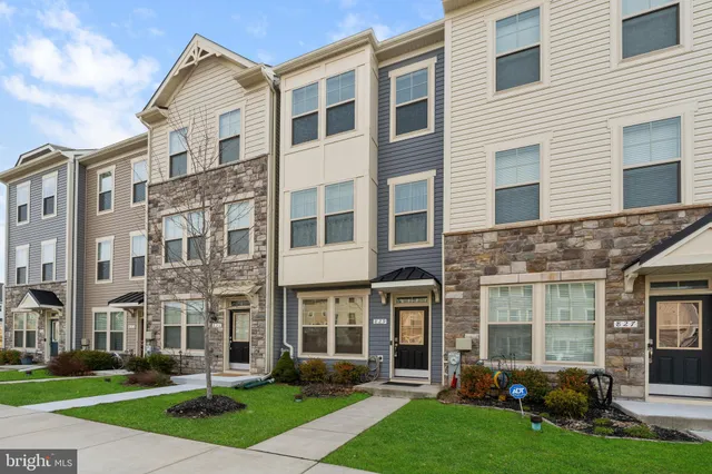 a view of a building with a yard