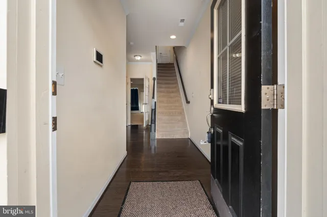 a view of hallway with stairs