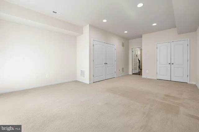 a bathroom with a sink a mirror and shower