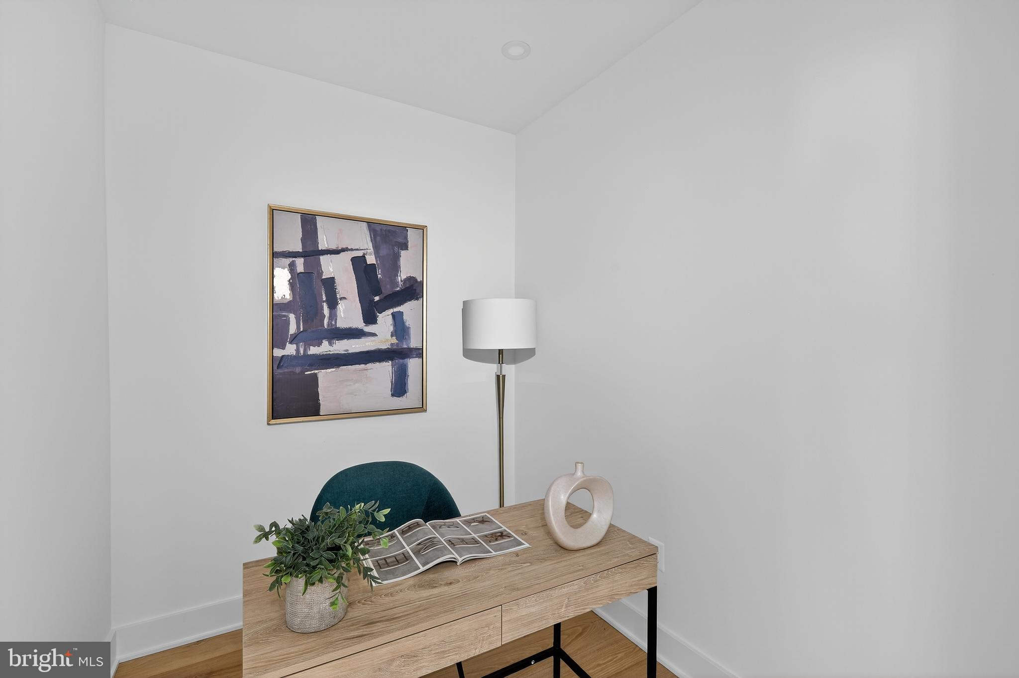 828 21st Street Northeast, Unit 1 Washington, DC 20002 - Photo 15 of 30 a room with table and chair