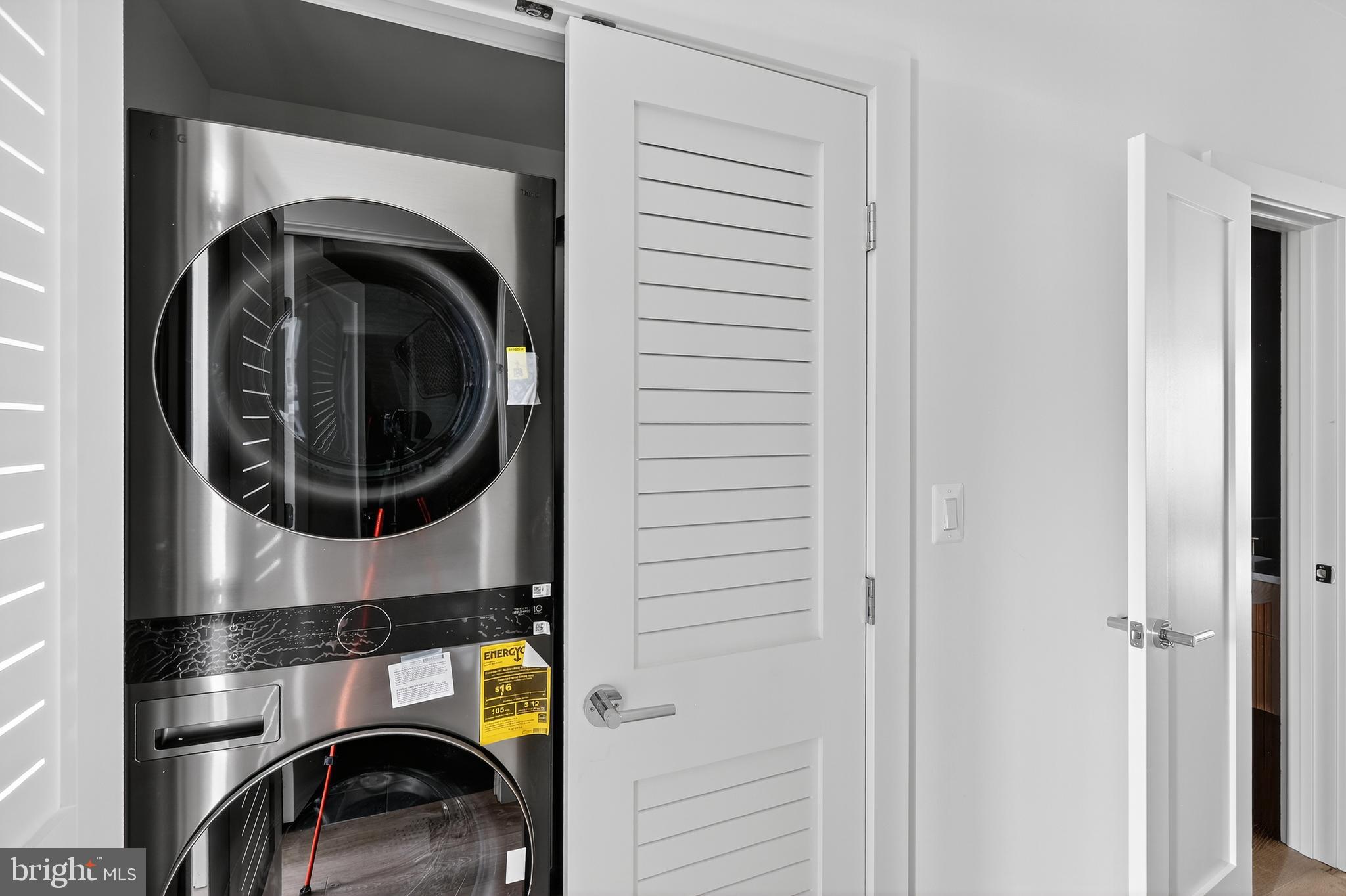 828 21st Street Northeast, Unit 1 Washington, DC 20002 - Photo 24 of 30 a utility room with dryer and washer