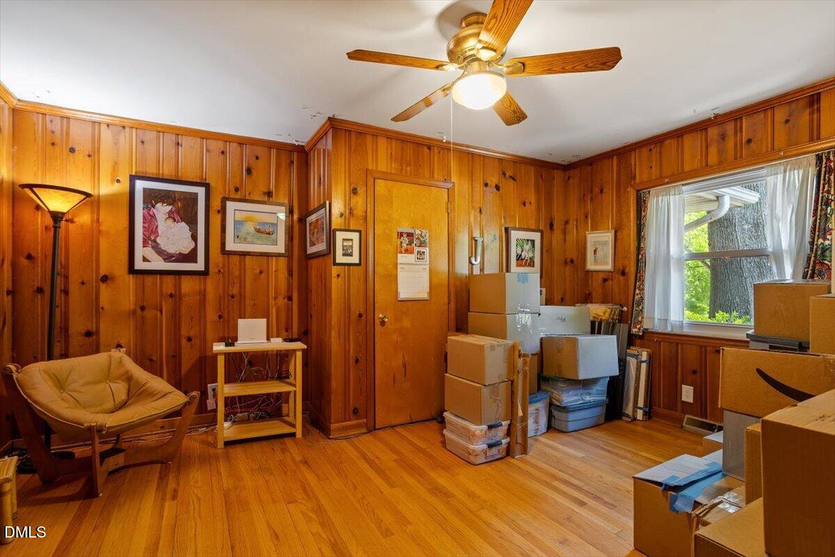 3107 Dixon Road Durham, NC 27707 - Photo 19 of 35 a living room with furniture a table and chairs