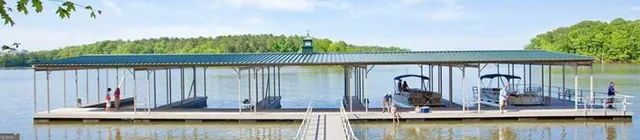 a view of backyard with wooden fence