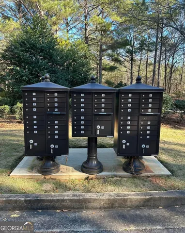 a view of a wooden door and a bench