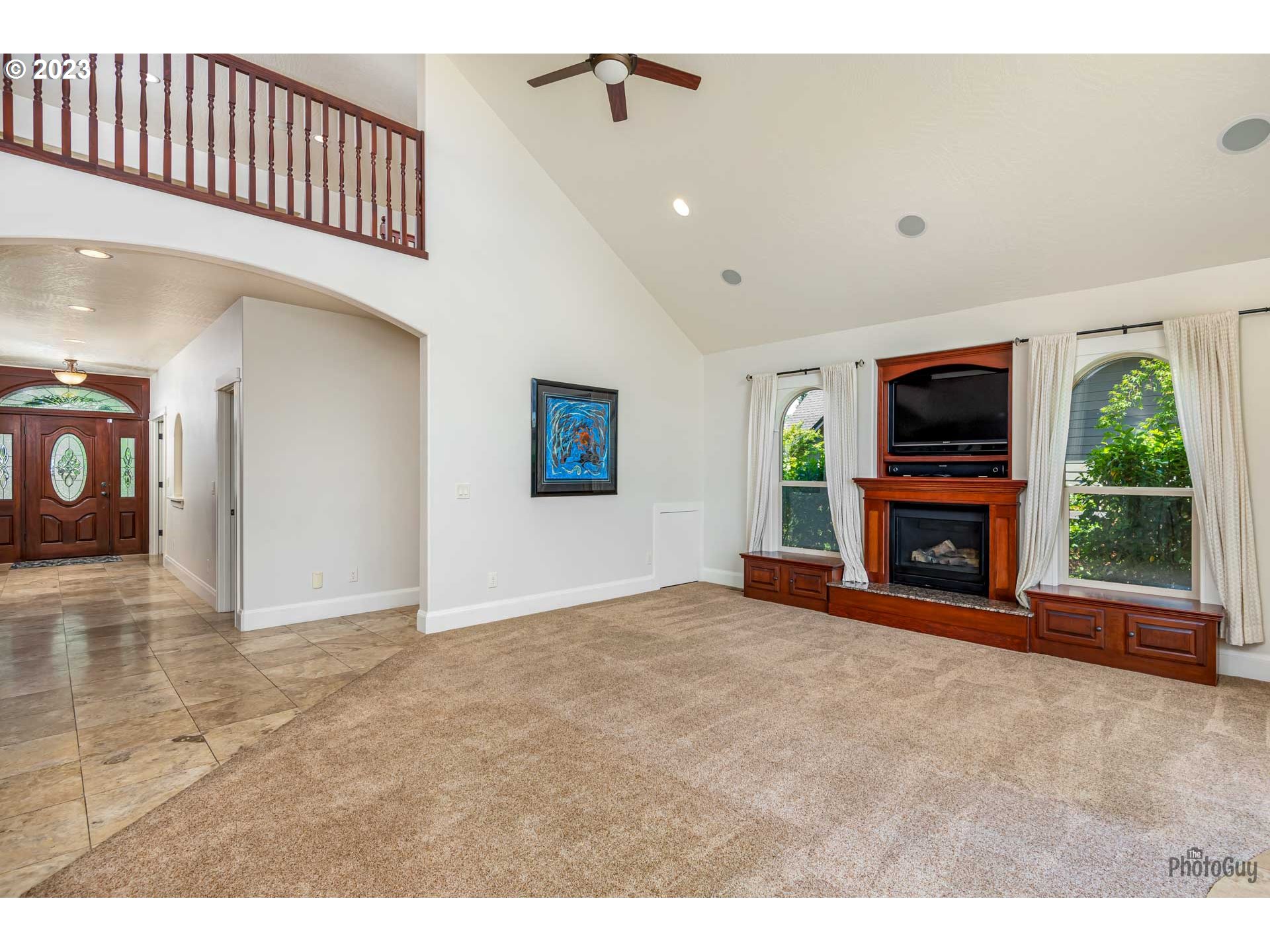 6099 Graystone Loop Springfield, OR 97478 - Photo 18 of 48 a view of a livingroom with a fireplace window and a fireplace