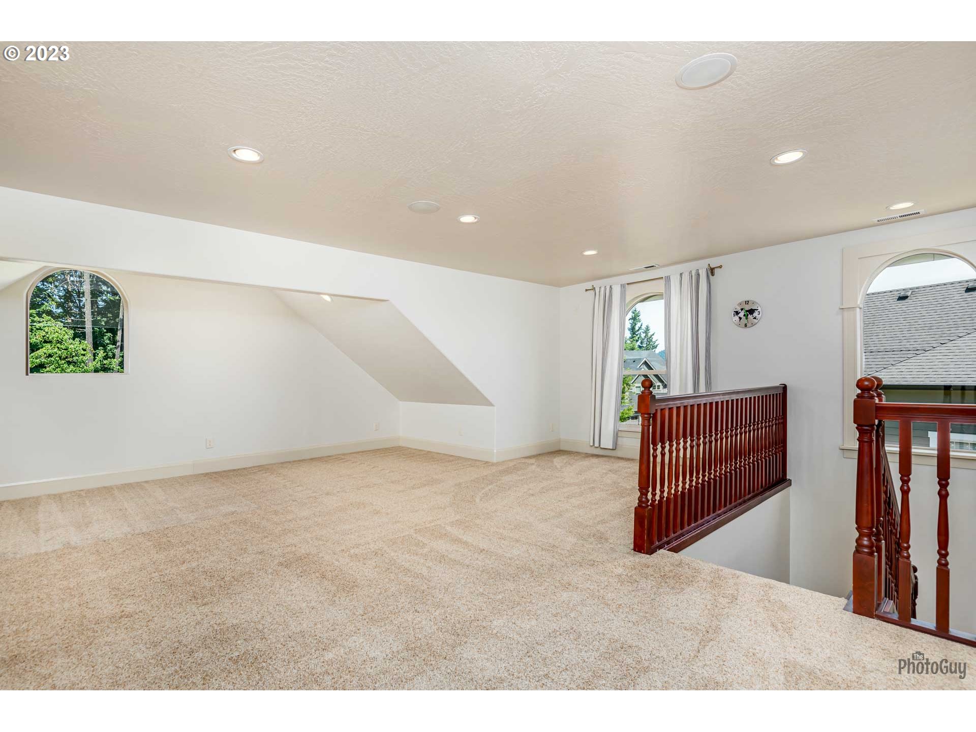 6099 Graystone Loop Springfield, OR 97478 - Photo 28 of 48 a view of an empty room with wooden floor