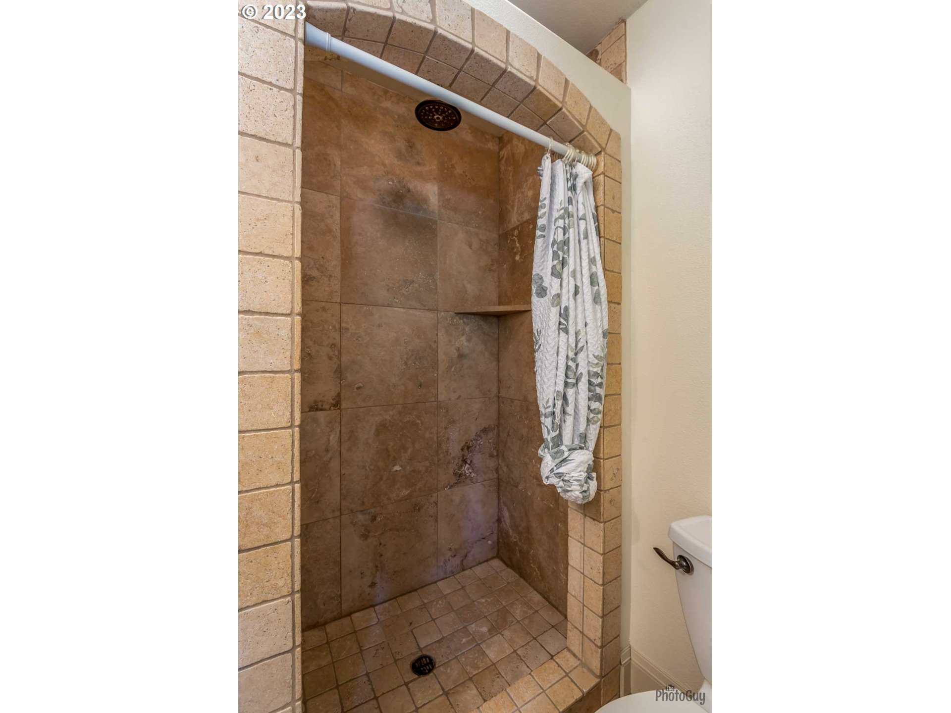 6099 Graystone Loop Springfield, OR 97478 - Photo 32 of 48 a bathroom with a shower and a sink