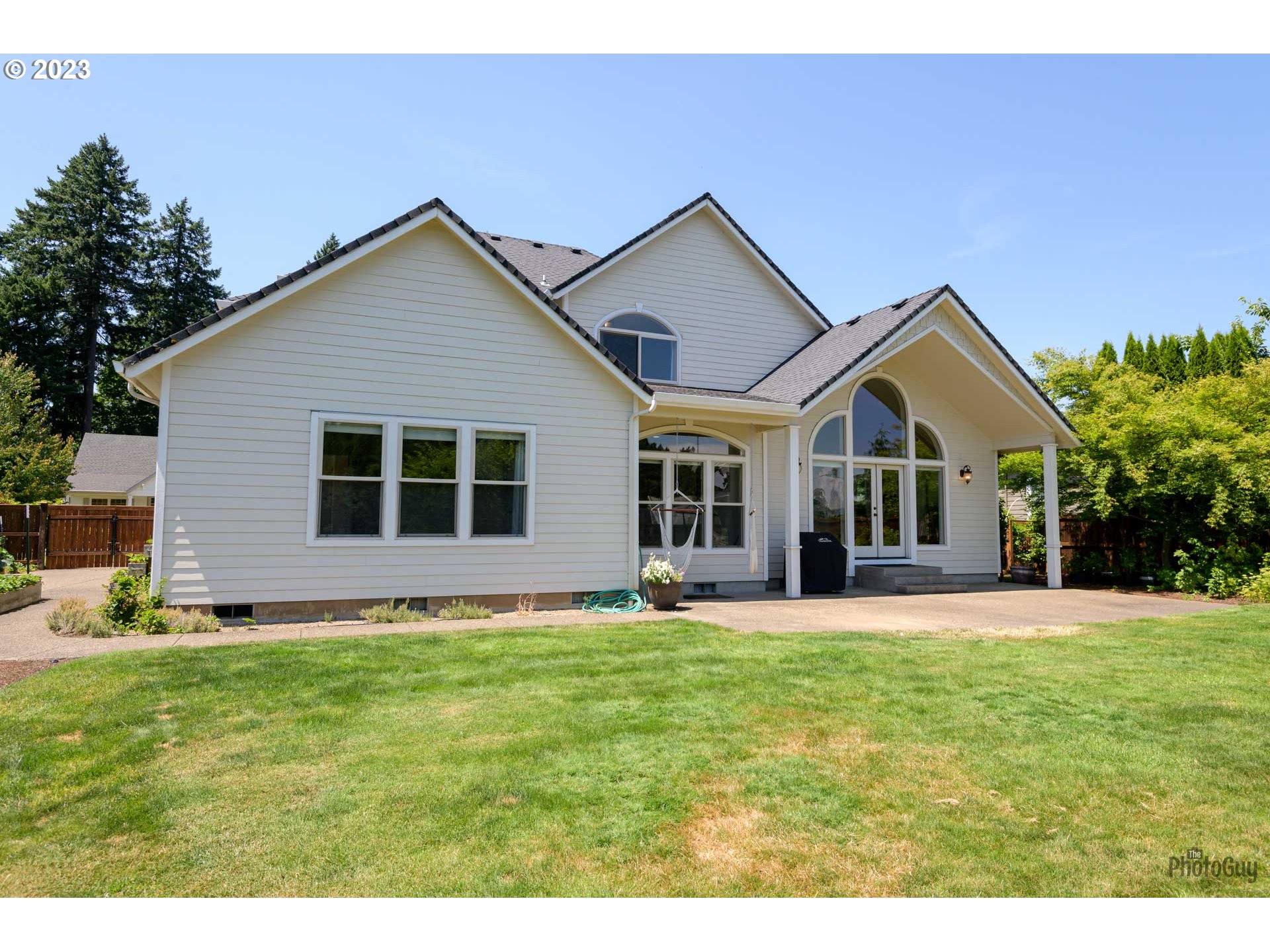 6099 Graystone Loop Springfield, OR 97478 - Photo 40 of 48 a front view of a house with a yard