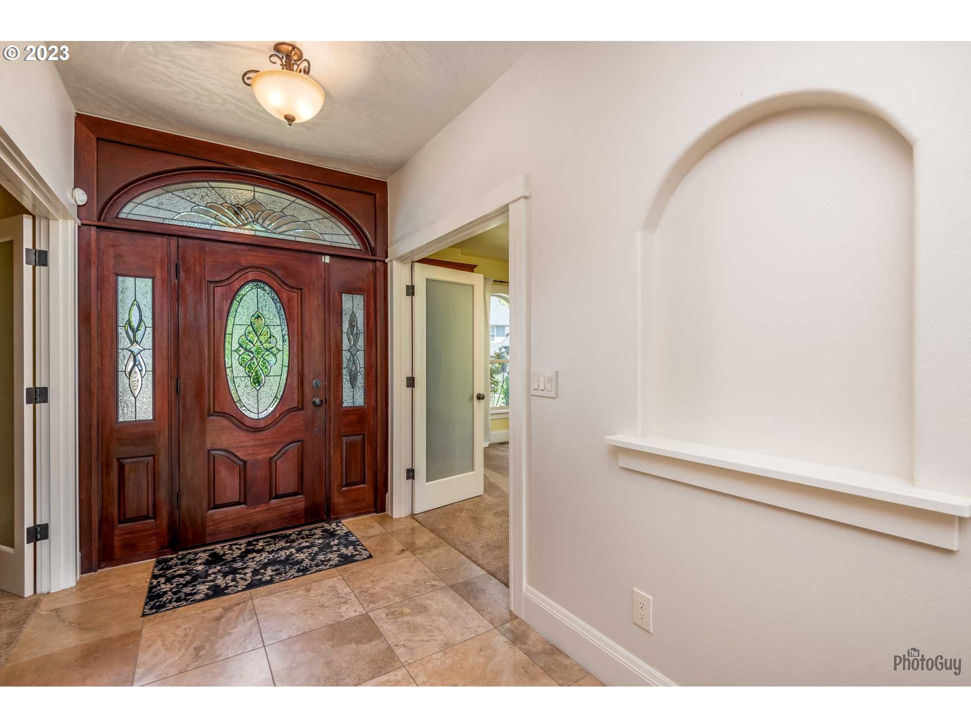 6099 Graystone Loop Springfield, OR 97478 - Photo 4 of 48 a front view of a house with garden