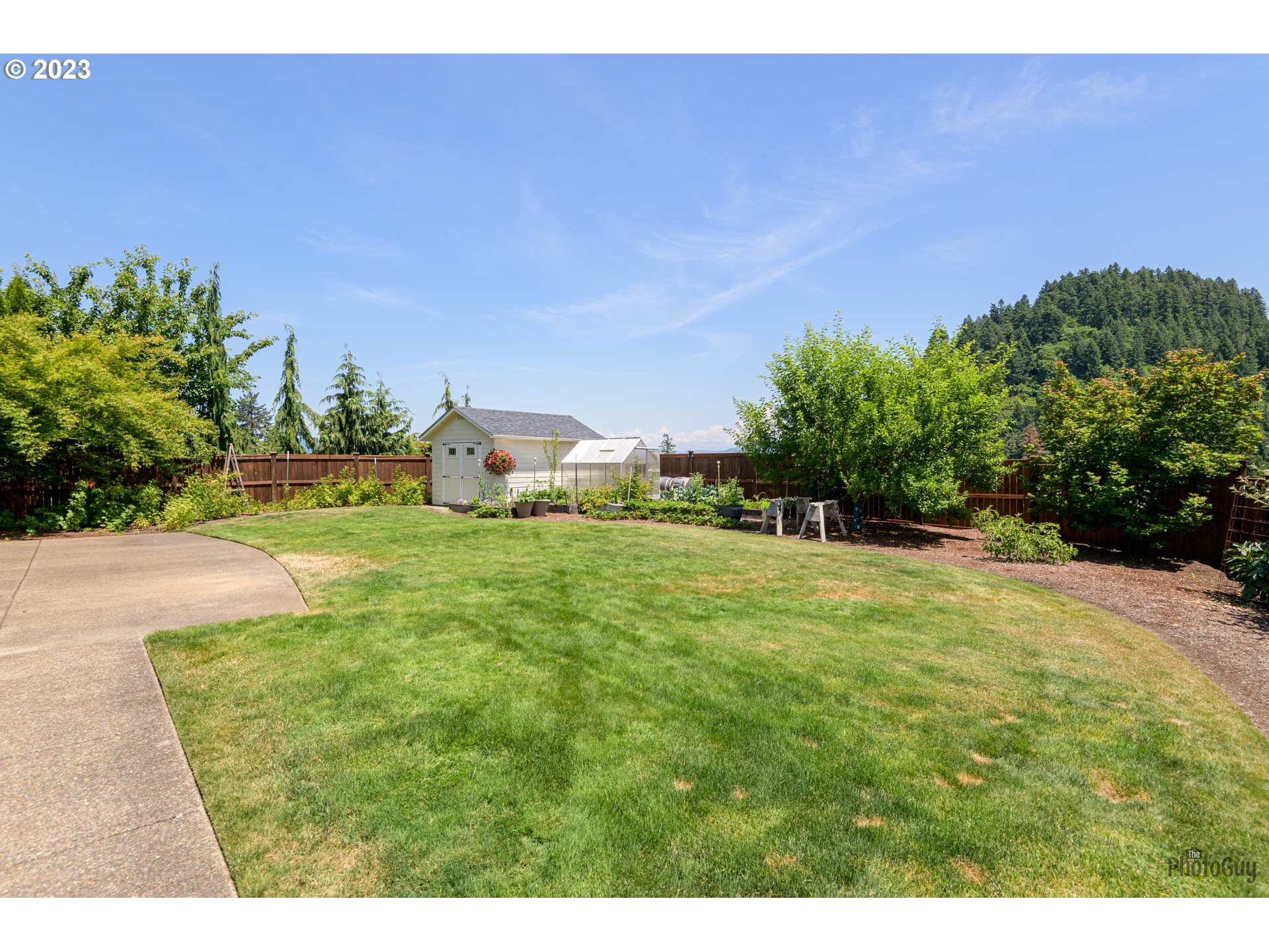 6099 Graystone Loop Springfield, OR 97478 - Photo 43 of 48 a view of a field with sitting area