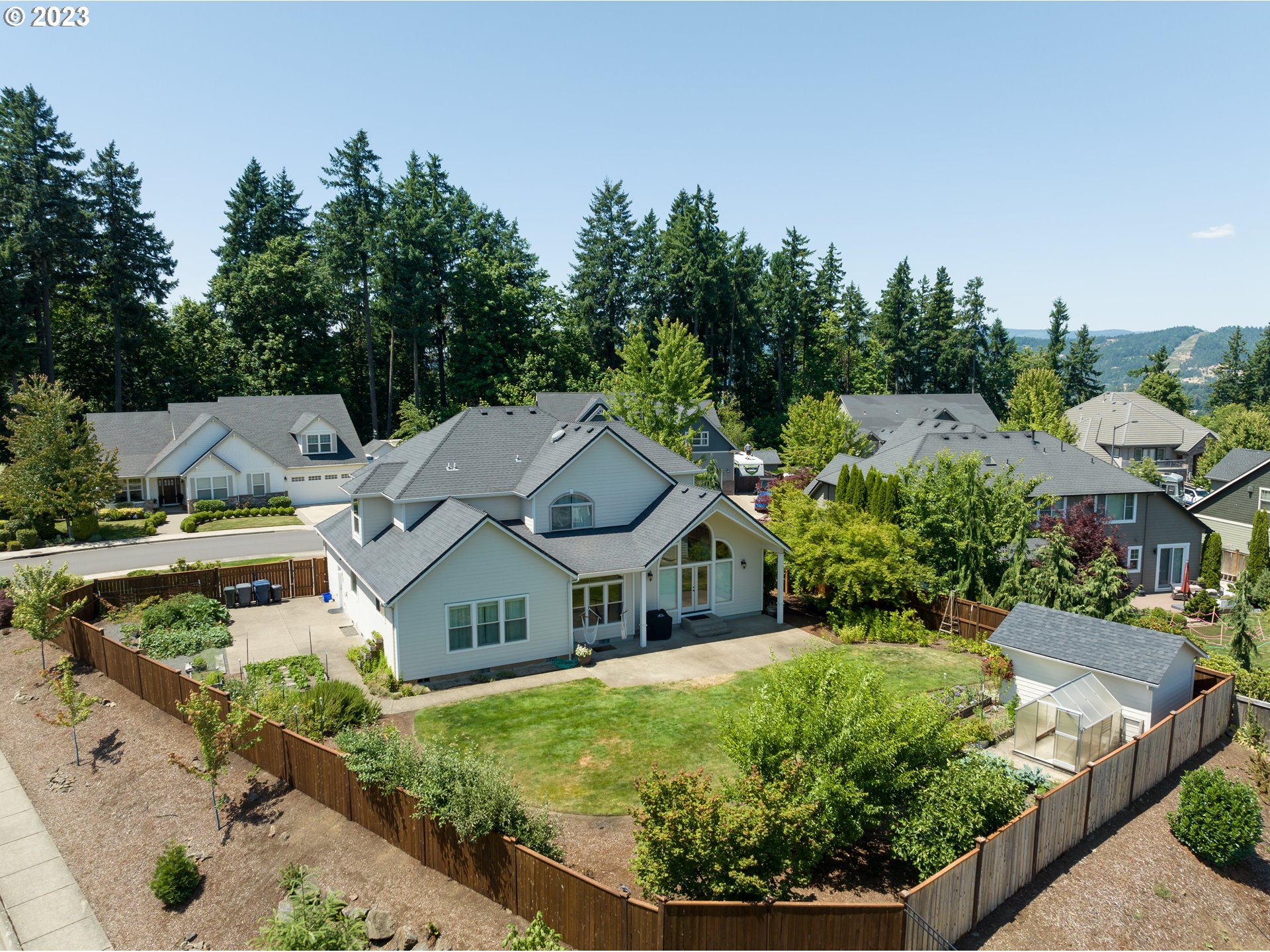 6099 Graystone Loop Springfield, OR 97478 - Photo 47 of 48 a aerial view of a house with a big yard and potted plants