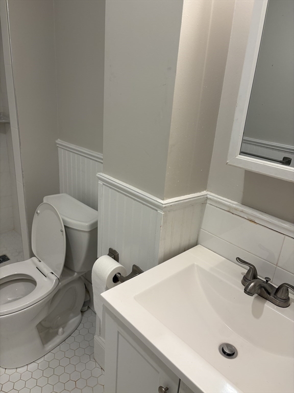 211 Beacon Street, Unit 2R Boston, MA 02116 - Photo 5 of 6 a bathroom with a toilet and a sink