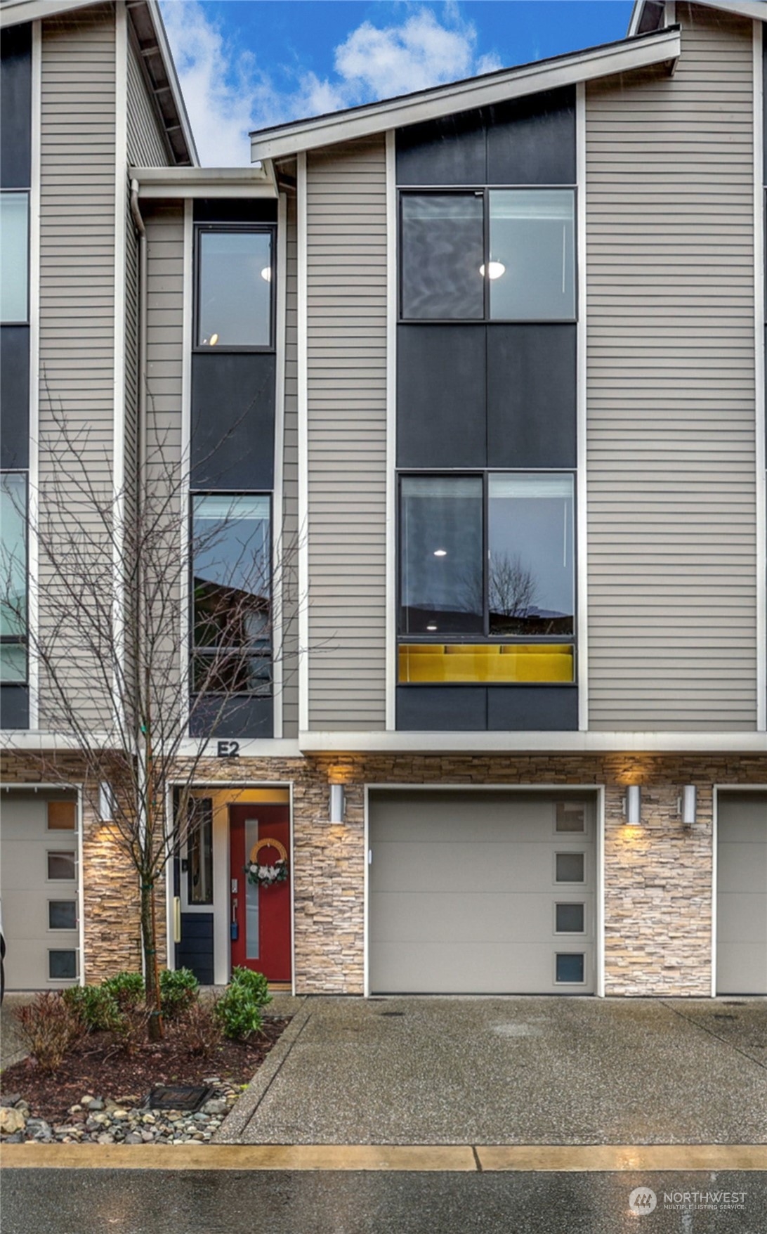 12718 35th Avenue Southeast, Unit E2 Everett, WA 98208 - Photo 1 of 28 a view of a building entryway