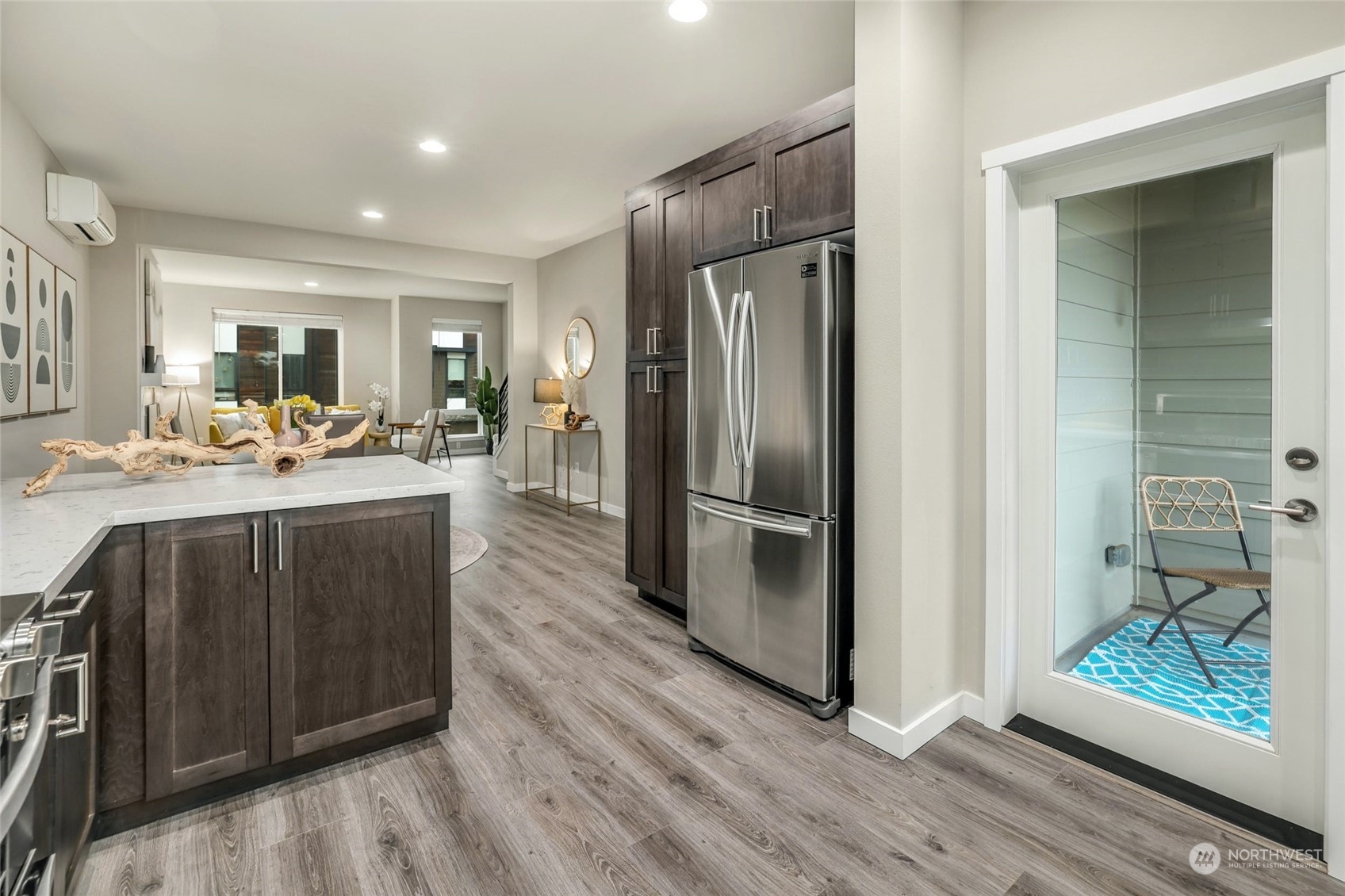 12718 35th Avenue Southeast, Unit E2 Everett, WA 98208 - Photo 13 of 28 a kitchen with stainless steel appliances granite countertop a refrigerator and a sink