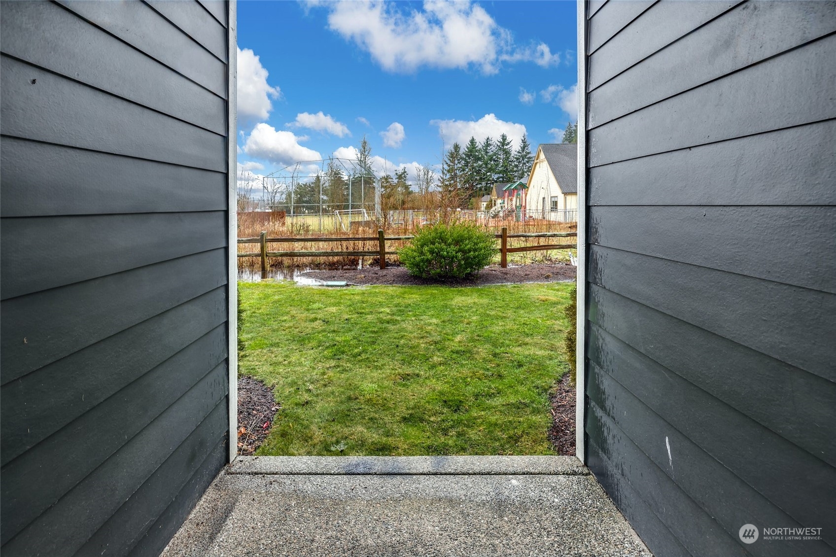 12718 35th Avenue Southeast, Unit E2 Everett, WA 98208 - Photo 26 of 28 a view of yard from window