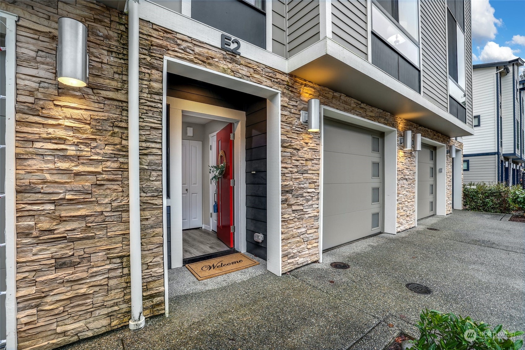 12718 35th Avenue Southeast, Unit E2 Everett, WA 98208 - Photo 3 of 28 a view of an entrance of the building