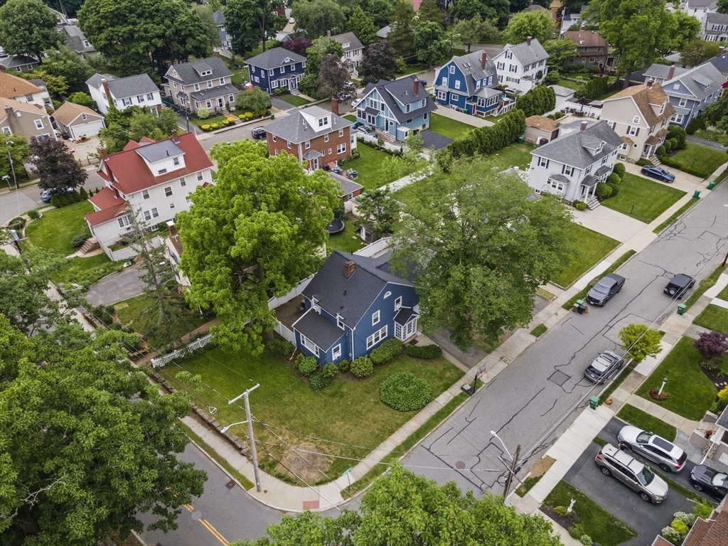 49 Jackson Road Medford, MA 02155 - Photo 3 of 36 an aerial view of residential house with outdoor space and swimming pool