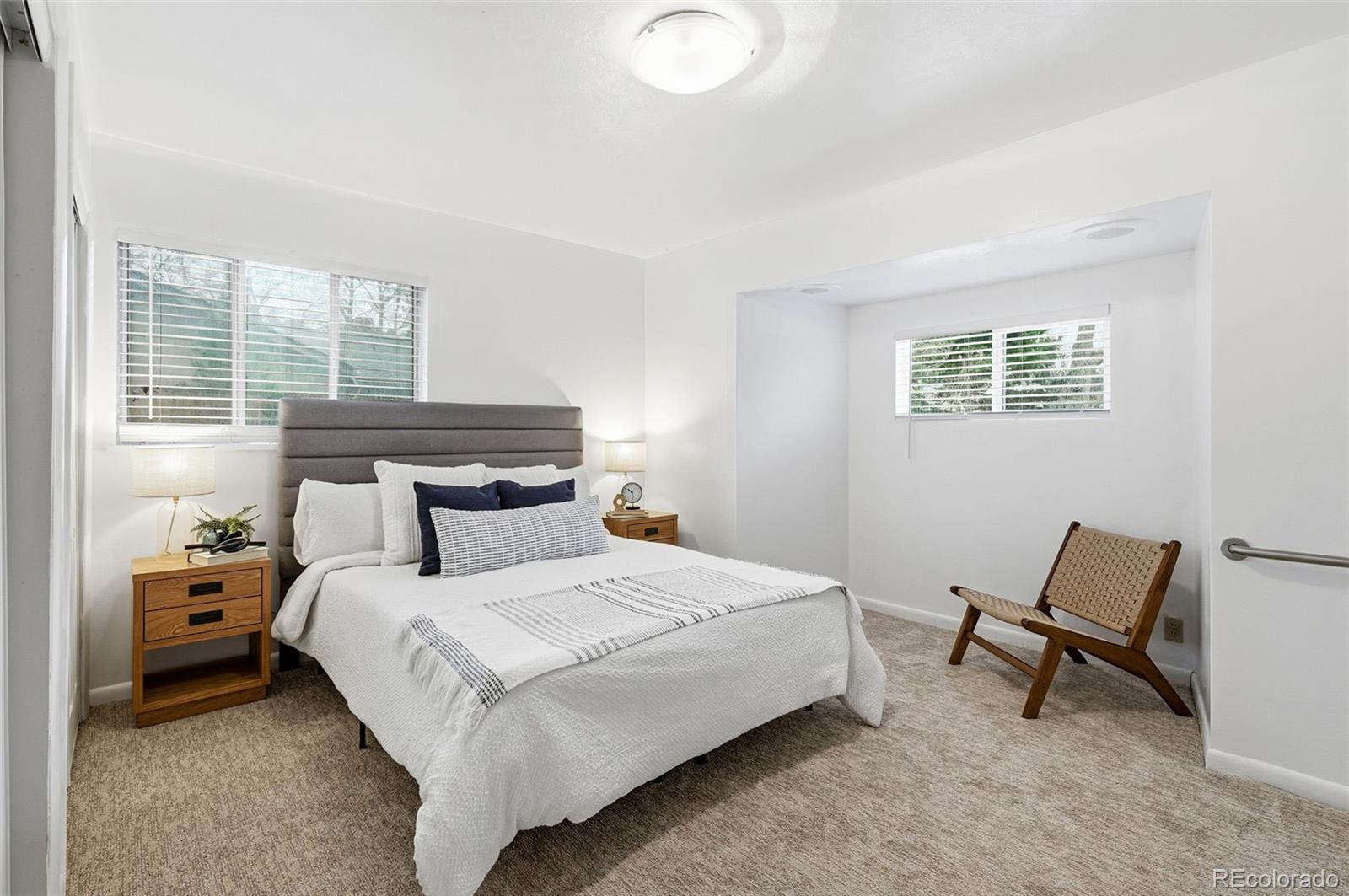 800 East Pinewood Avenue Littleton, CO 80121 - Photo 20 of 42 a bedroom with a bed and a window