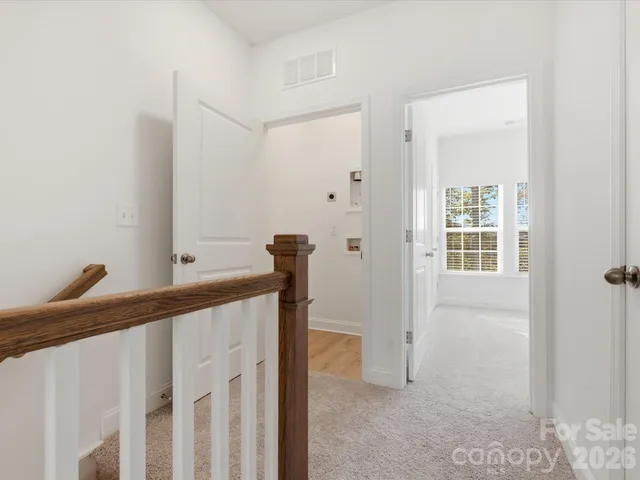 a view of entryway with a wooden floor