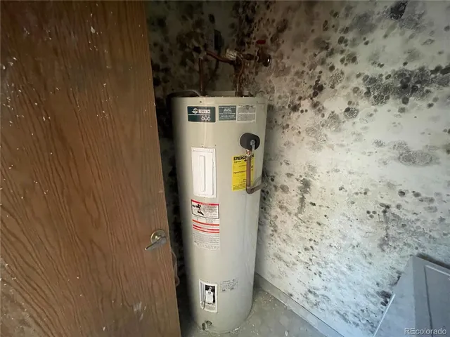 a view of a hallway with wooden shelves