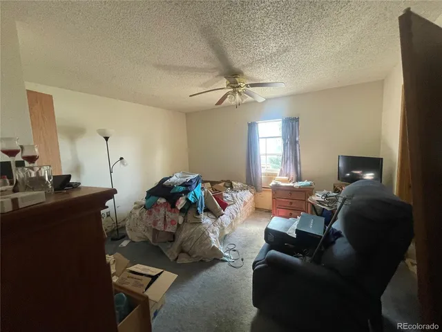a bathroom with a sink vanity mirror and toilet