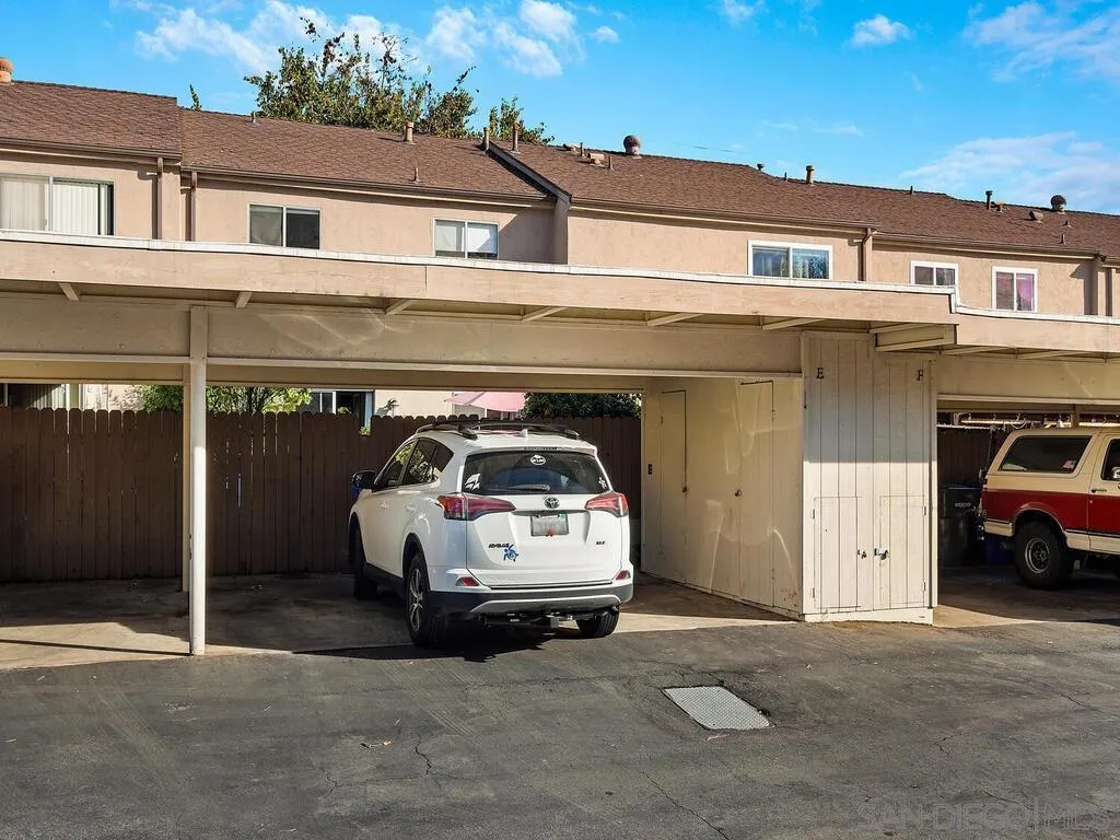 8022 Winter Gardens Boulevard, Unit E El Cajon, CA 92021 - Photo 28 of 30 a car parked in front of a building