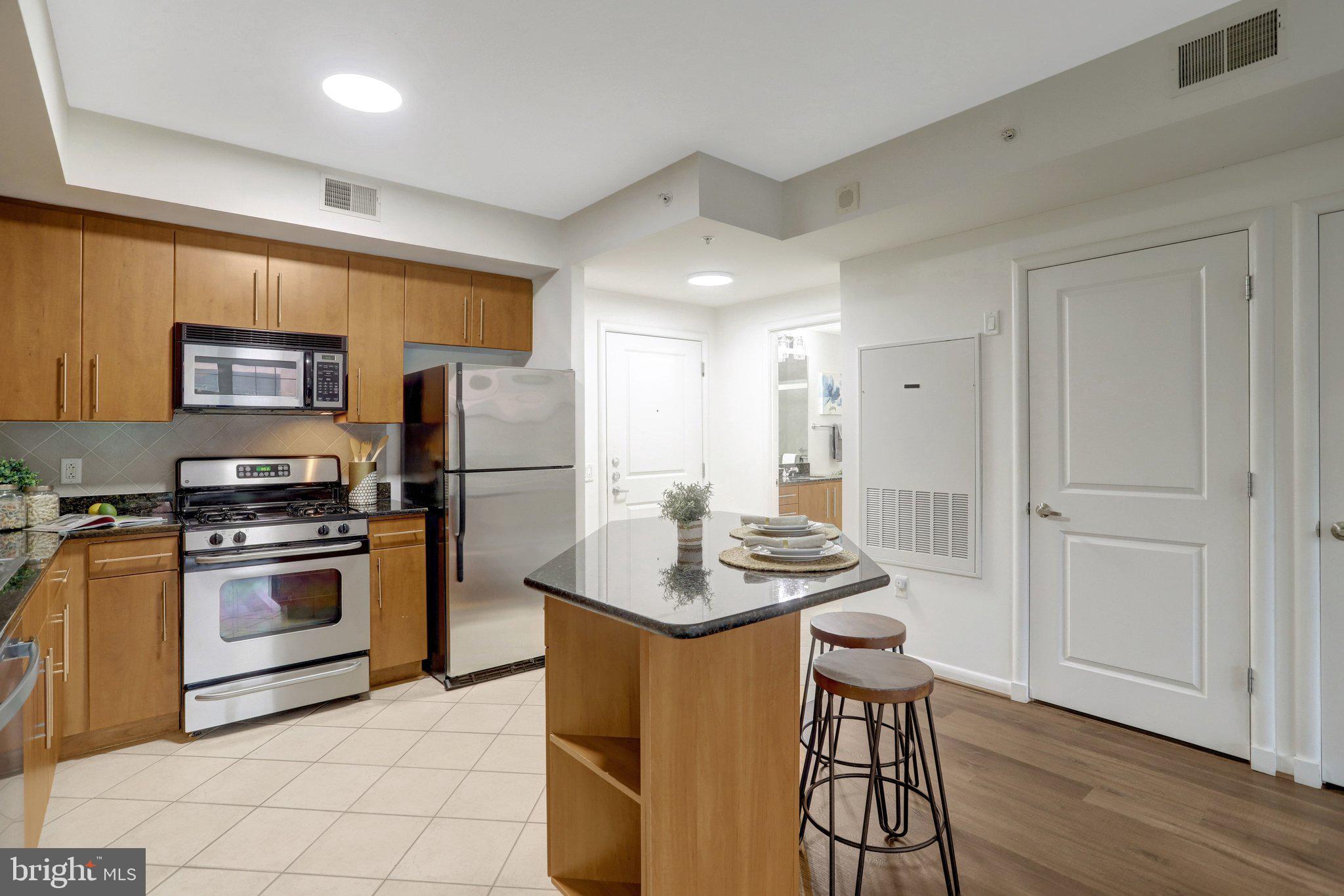 1021 North Garfield Street, Unit 315 Arlington, VA 22201 - Photo 9 of 43 Stainless appliances w/gas cooking