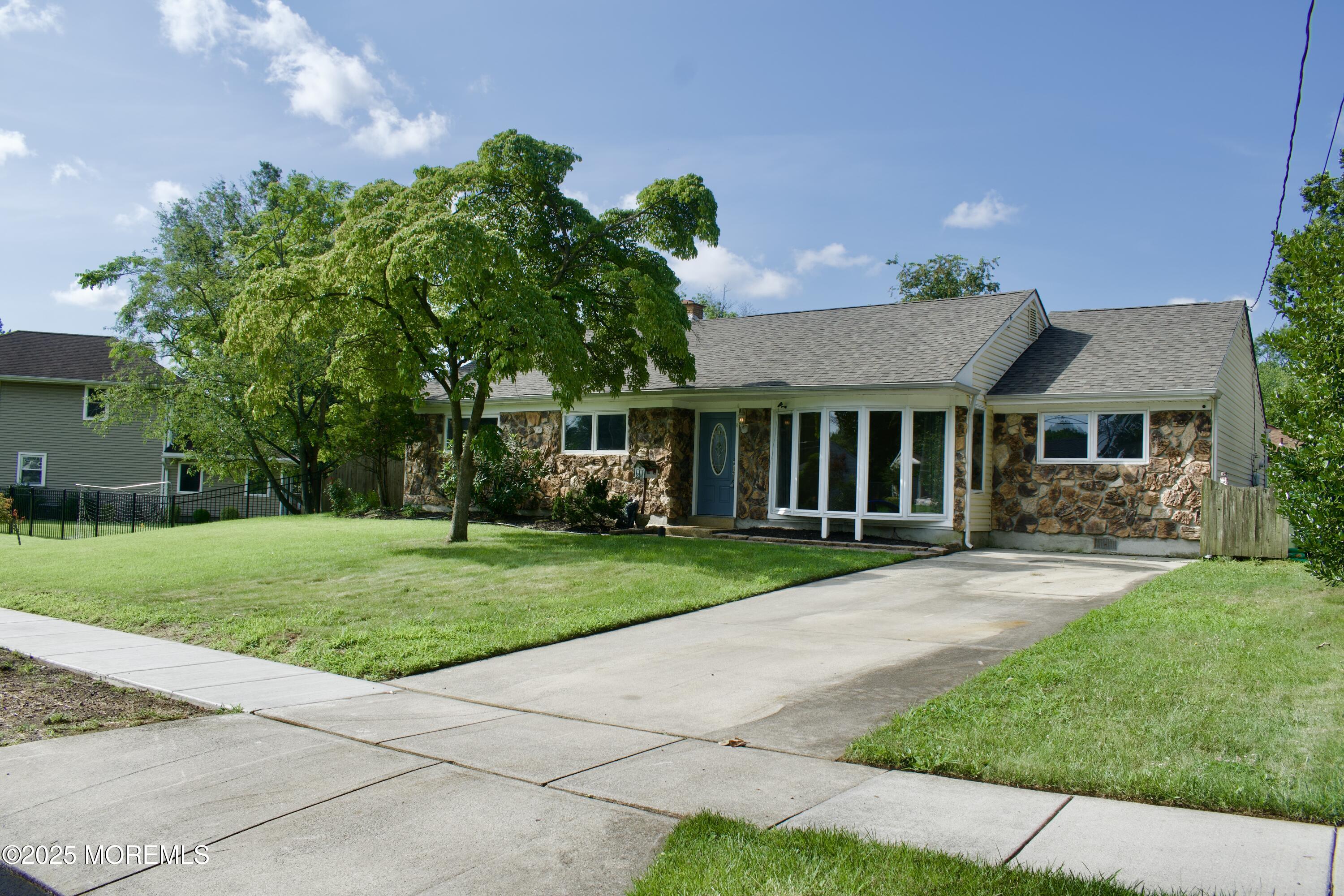 212 Kingsley Road Cherry Hill, NJ 08034 - Photo 4 of 27 a front view of a house with a yard